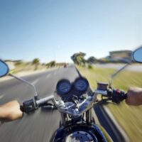 Man Riding Motorcycle During The Day Stock Photo