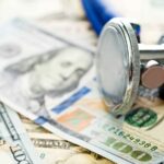 Dollar Bills With Stethoscope Stock Photo