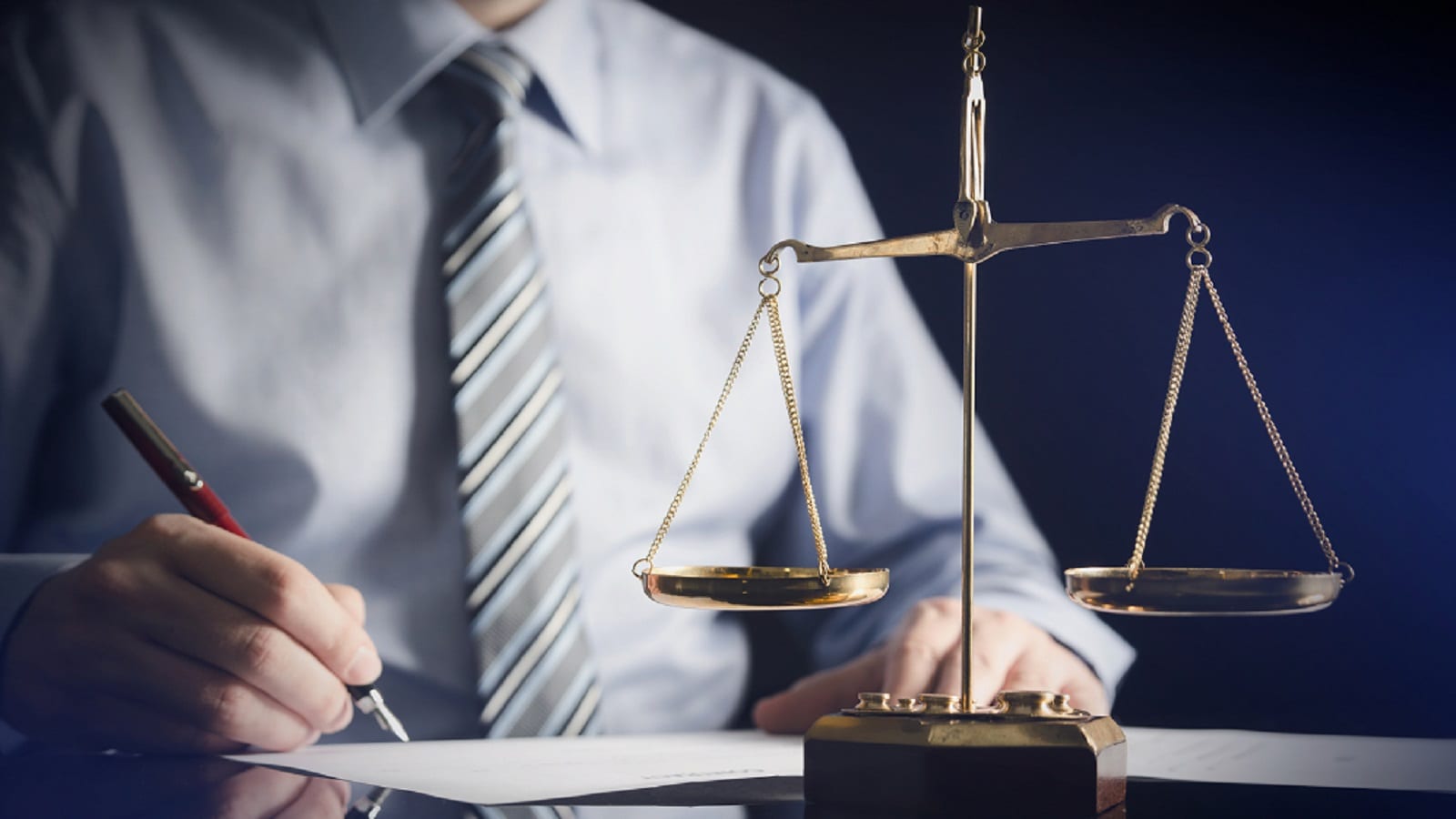 Attorney Signing A Document Stock Photo